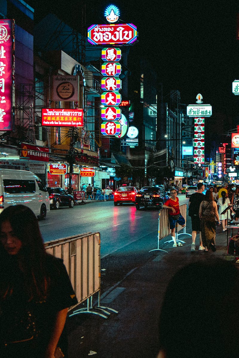 Explore the bustling nightlife of Bangkok's Chinatown packed with neon lights and street vendors.